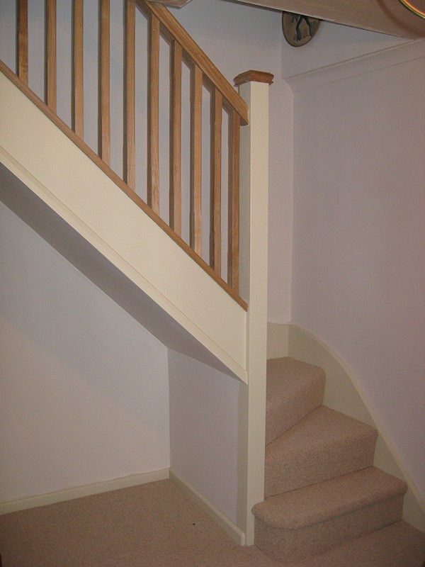 This softwood winder staircase was for a loft conversion. It has an all oak balustrade.