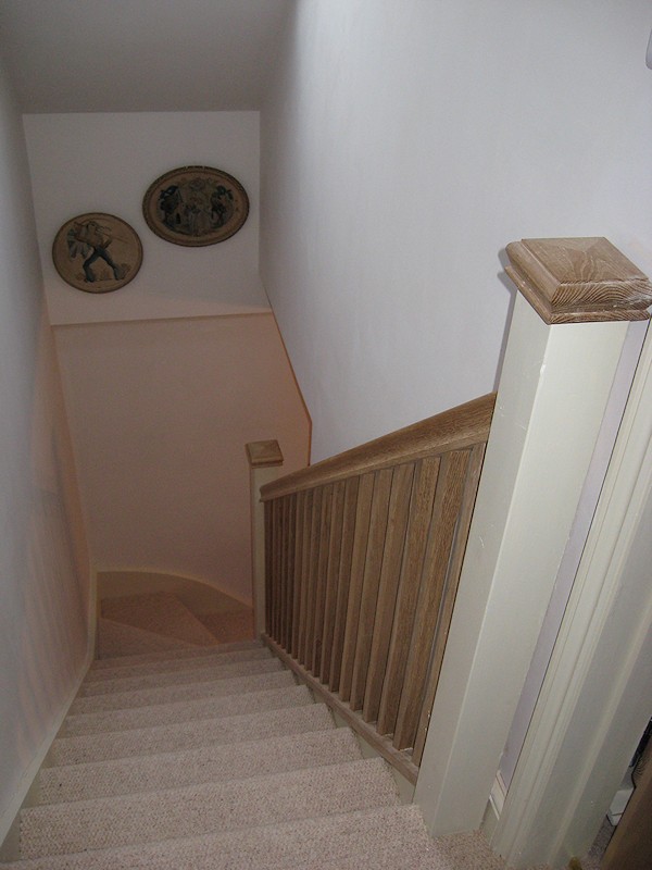 This softwood winder staircase was for a loft conversion. It has an all oak balustrade.