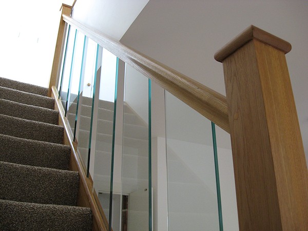 A clockwise single turn, three winder staircase in oak construction.