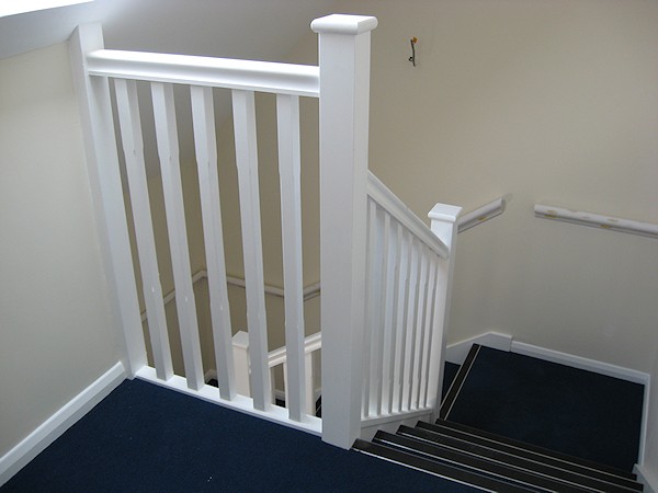 Two softwood painted stairs designed for high traffic usage.