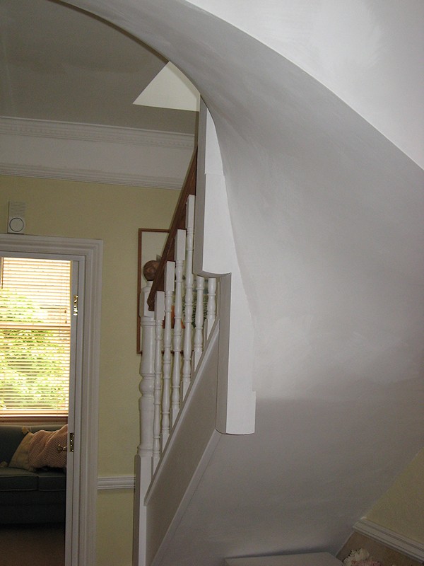 This softwood staircase for a loft conversion has a total of nine winders turning three times over 270 degrees.