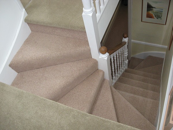 This softwood staircase for a loft conversion has a total of nine winders turning three times over 270 degrees.