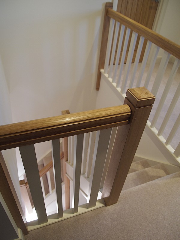 A softwood single turn winder staircase for a loft conversion.