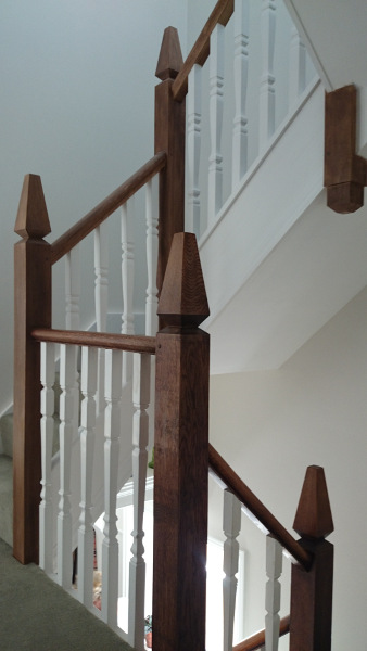 A very unique staircase, just look at those newel tops!