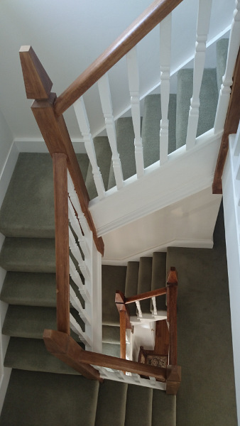 A very unique staircase, just look at those newel tops!