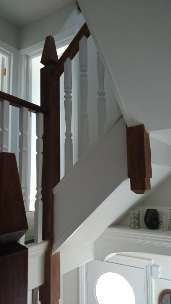 A very unique staircase, just look at those newel tops!