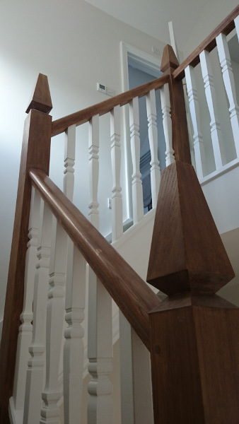 A very unique staircase, just look at those newel tops!