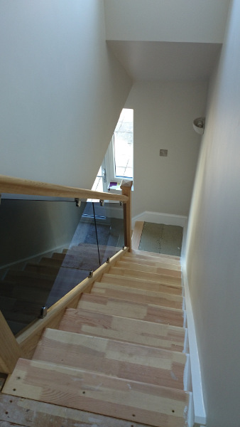 Staircase with glass infill panel.