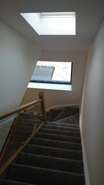 Two staircases positioned in this vast entrance hall.