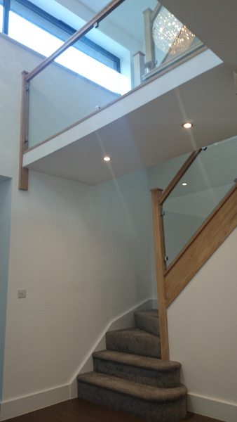 Two staircases positioned in this vast entrance hall.