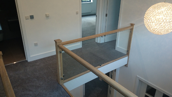 Two staircases positioned in this vast entrance hall.