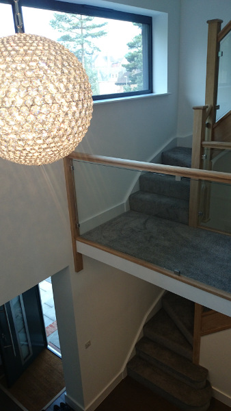 Two staircases positioned in this vast entrance hall.