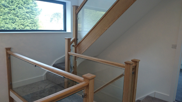 Two staircases positioned in this vast entrance hall.