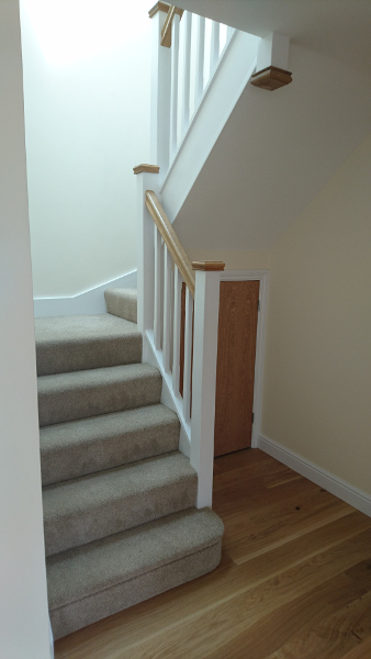 Staircases with redwood construction with stop chamfer spindles.