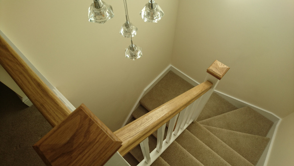 Staircases with redwood construction with stop chamfer spindles.